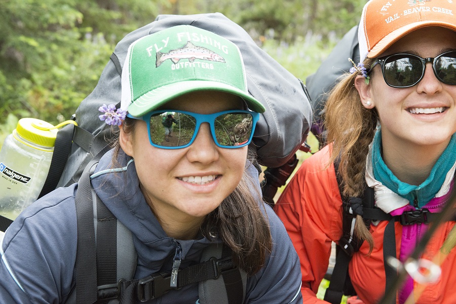 two girls with camping gear